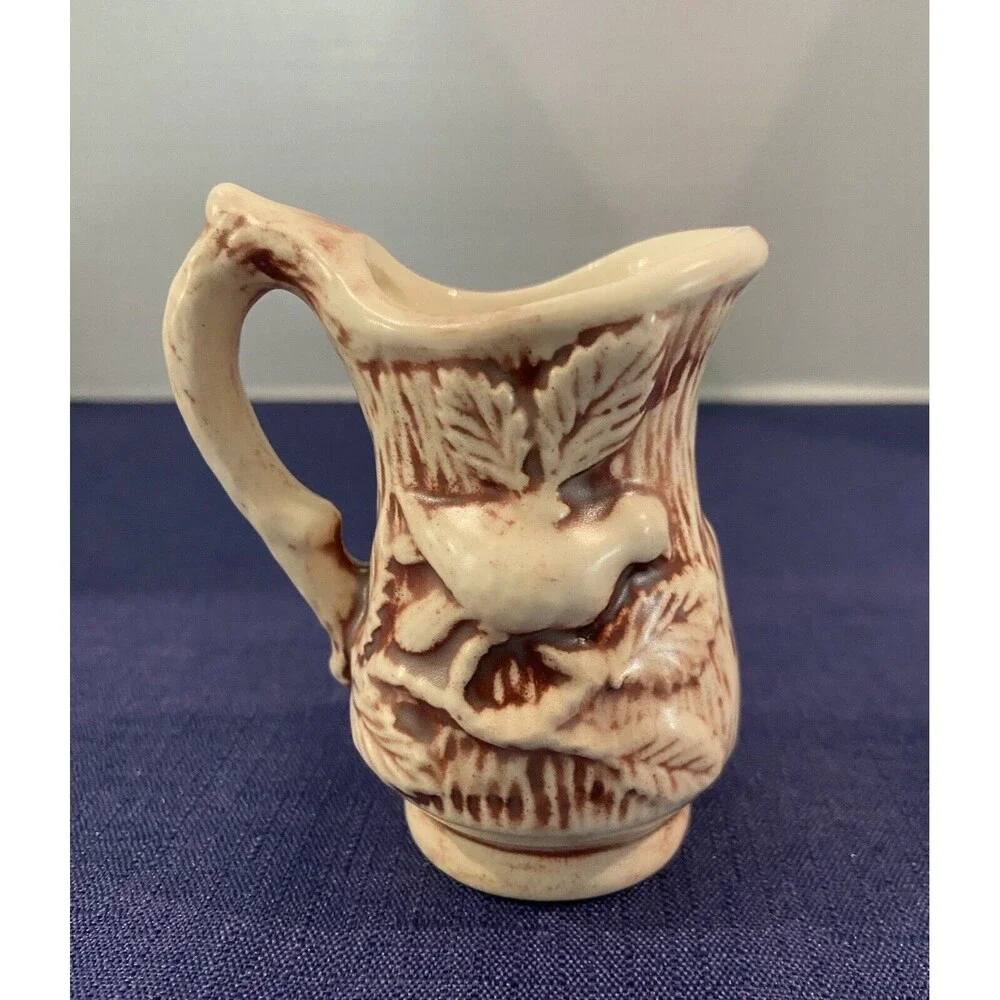 1970’S - Miniature Ceramic burgundy & Cream Embossed Flowers Water Pitcher Decor